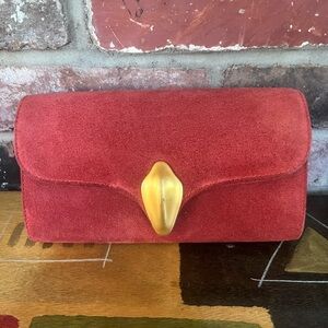 Vintage Robert Lee Morris Rust Colored
Suede Clutch.